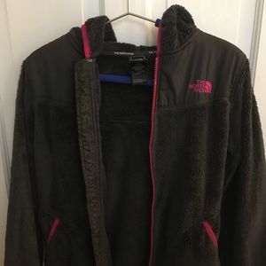 Gray North Face zip-up.
